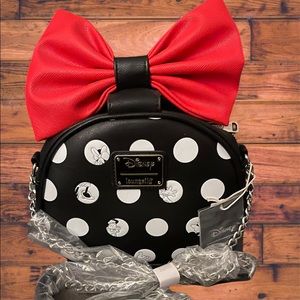 Brand new adorable Loungefly Minnie Mouse polka dot crossbody.